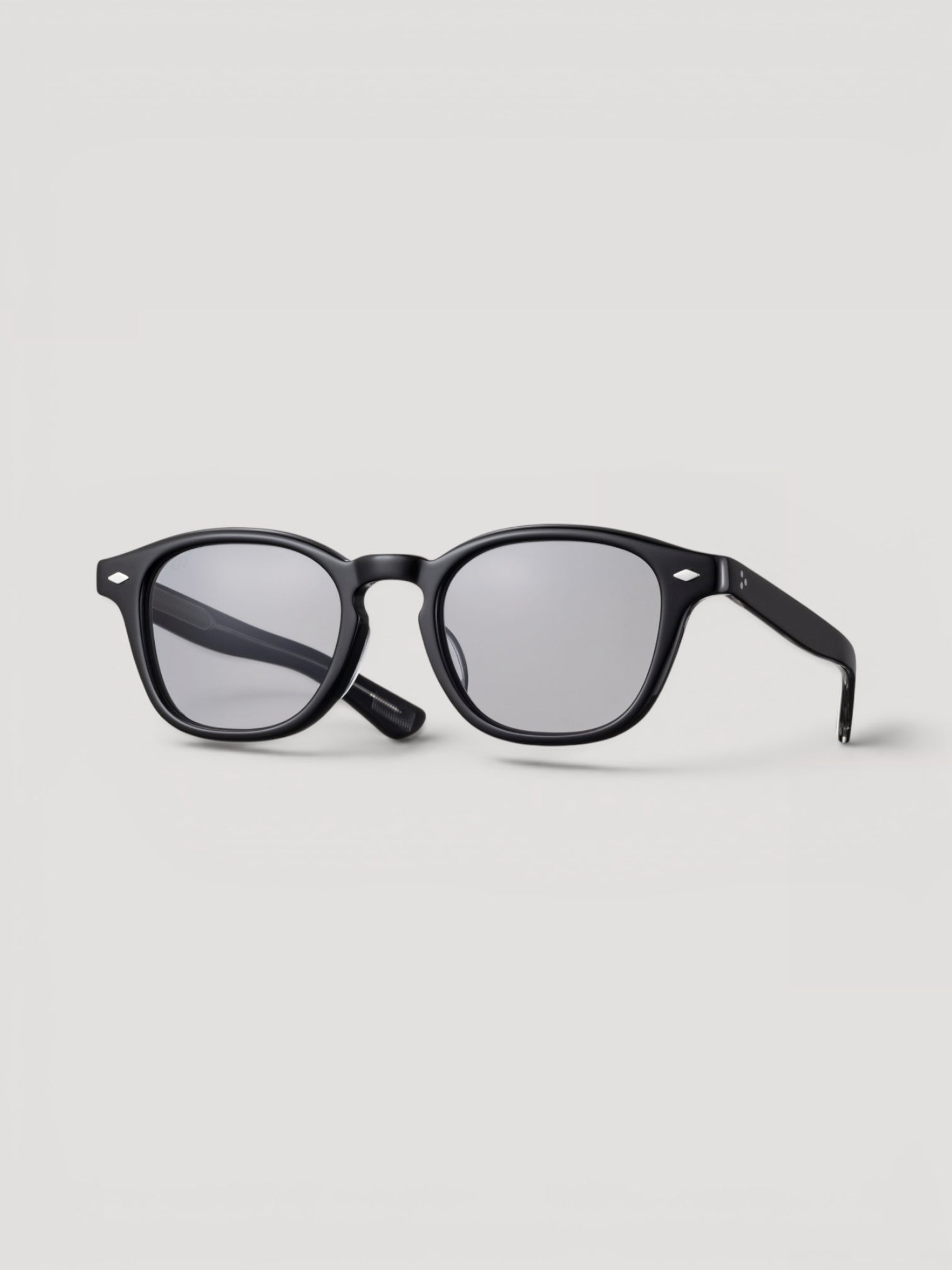 Momentum & Friends EYEVAN Byron round sunglasses in matte black acetate with subtle metal hinge accents